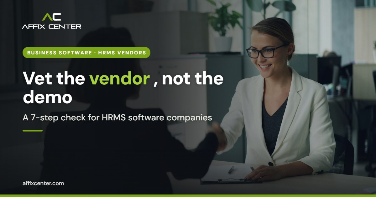 Two professionals shaking hands across a desk after an HRMS vendor meeting
